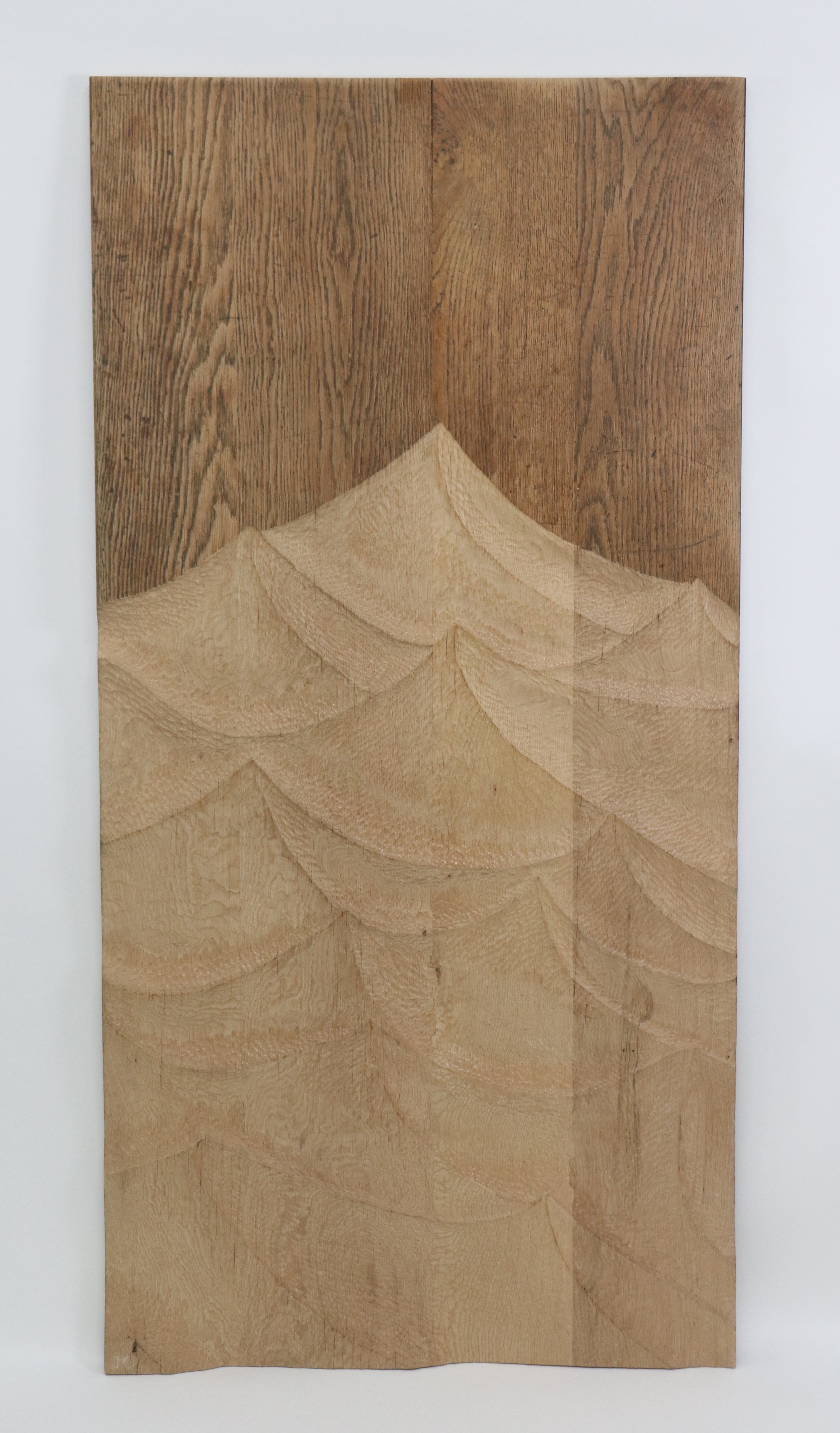 image of wood carved like waves